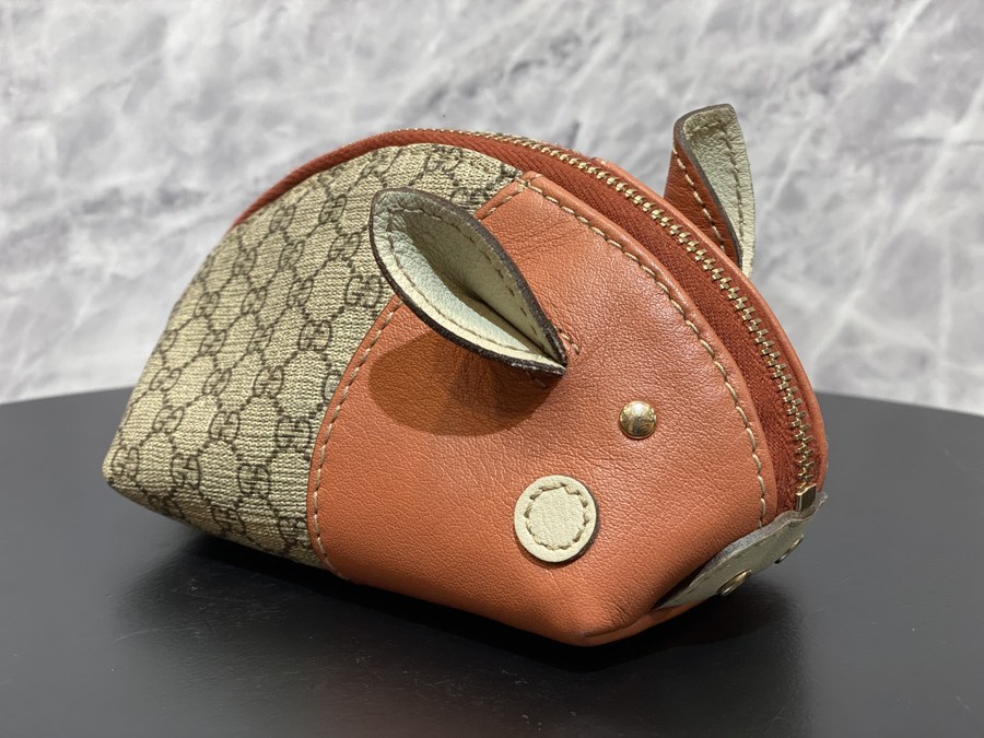 Gucci pig hot sale coin purse